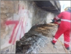 Hacking to beam at shore beam repair